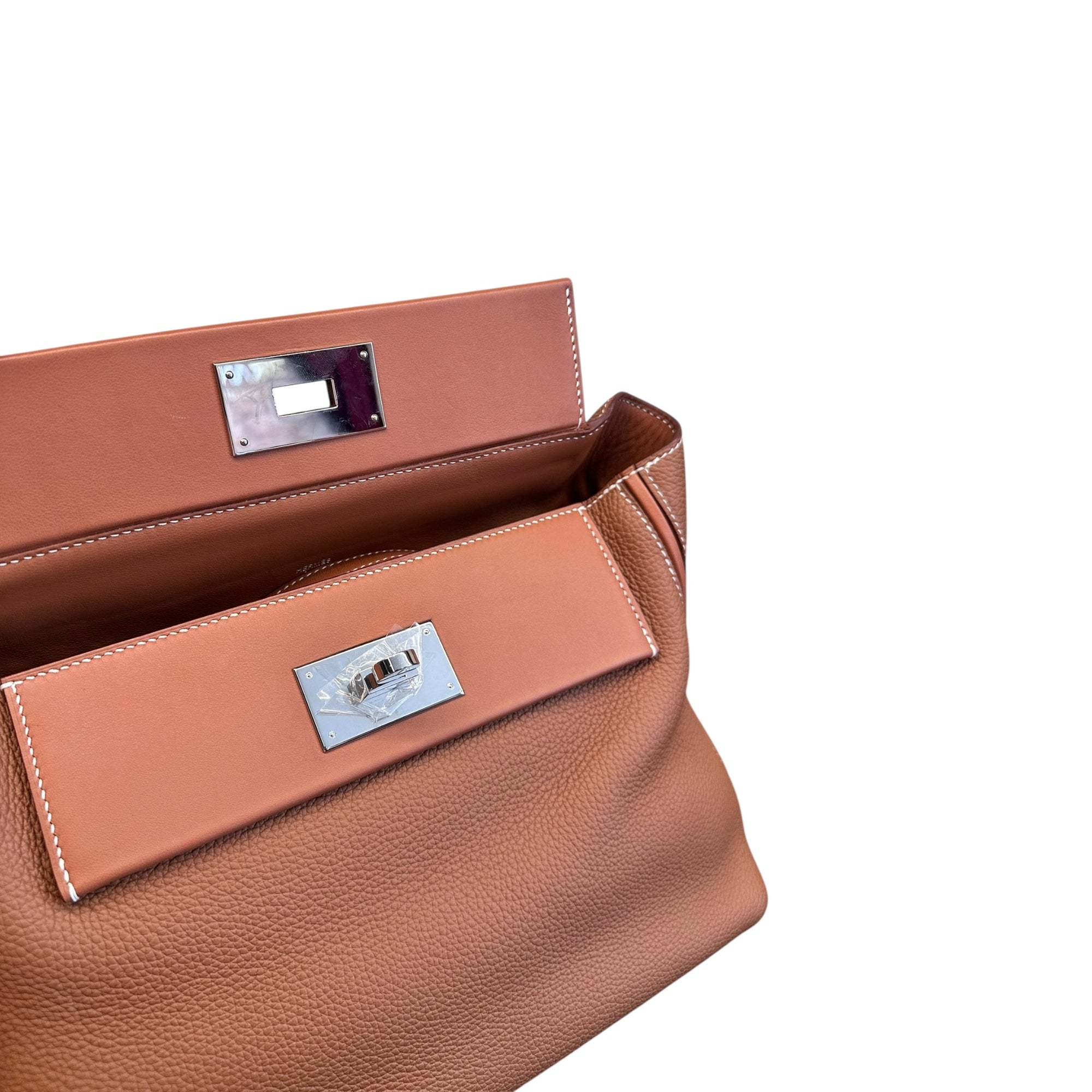 HERMÈS 24/24